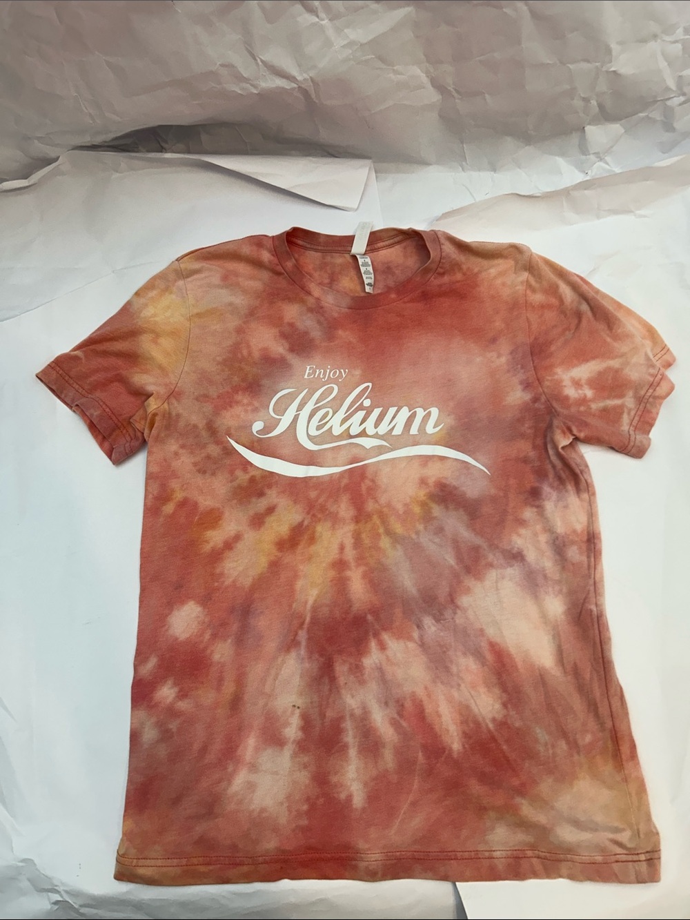 “Enjoy Helium” Coca-Cola Style Print on Tie-Dye Tee in Coral Peach/Pink Rust